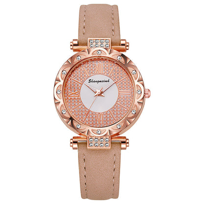 Korean-style quartz watch with a simple leather strap.