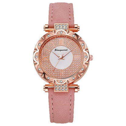 Korean-style quartz watch with a simple leather strap.
