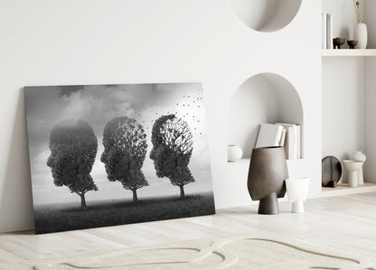 Three Head Shaped Trees Losing Leaves Glass Wall Art