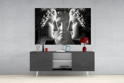 Black and White Mirrored Statue Faces Glass Wall Art